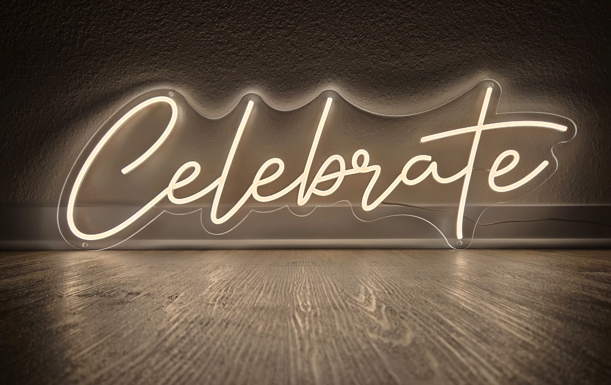 Warm white Celebrate neon sign